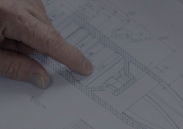 Linked image of closeup of hand working with equipment